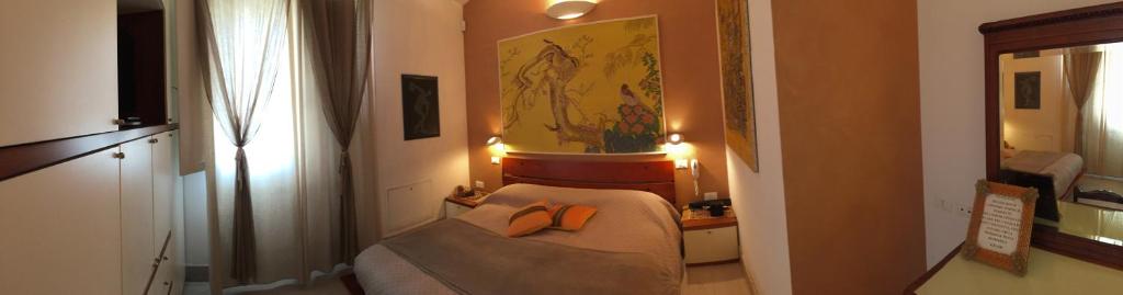 A bed or beds in a room at Bed & Breakfast Case Osti
