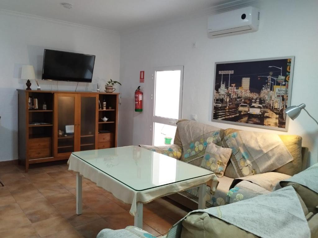 Una televisión o centro de entretenimiento en El apartamento de Ana -Jerez
