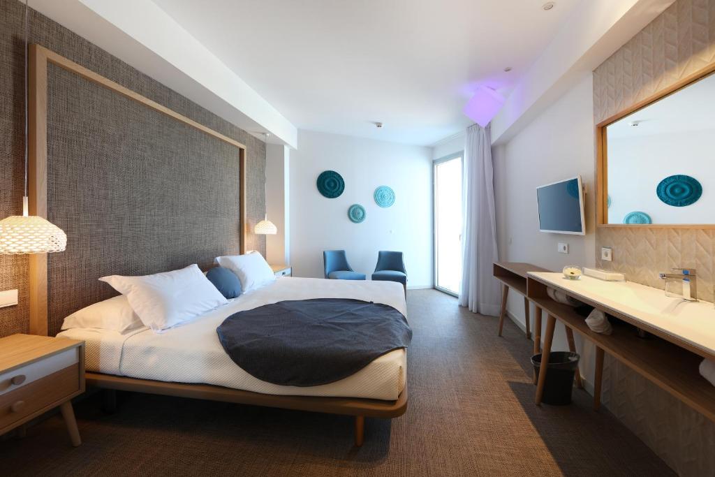 Postel nebo postele na pokoji v ubytování Mar Azul Pur Estil Hotel & Spa
