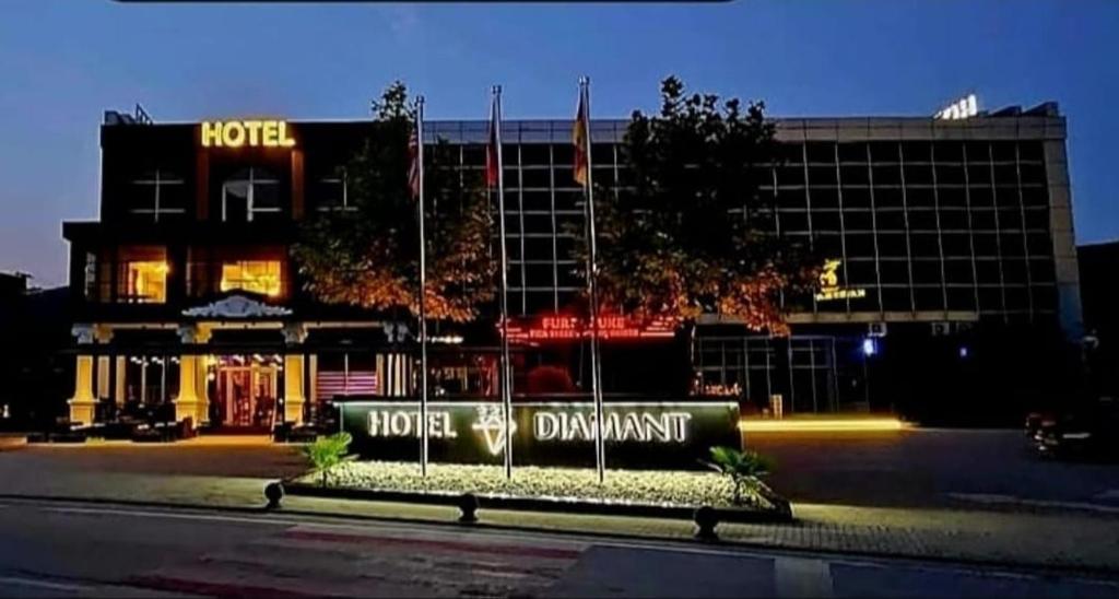 a hotel withdrawal sign in front of a building at Hotel Diamant in Tropojë
