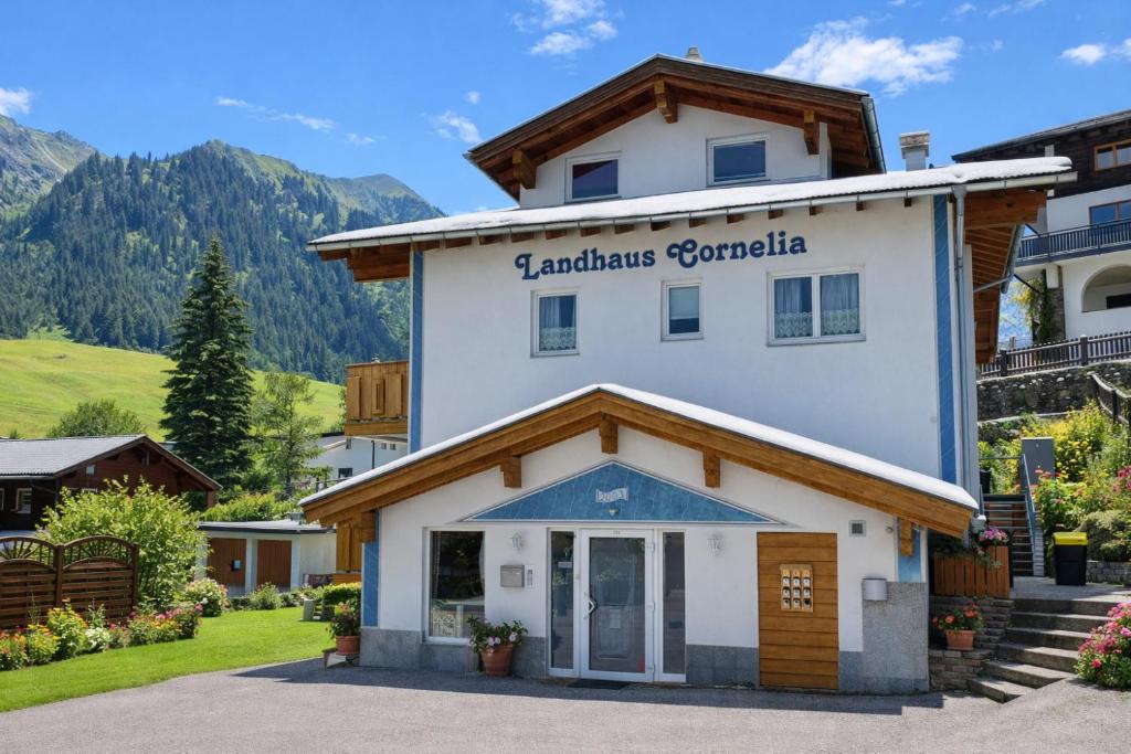 a building with a sign that reads zermatt gran paradiso at Landhaus Cornelia in Berwang