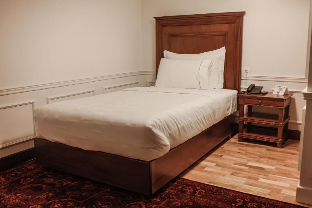 Postel nebo postele na pokoji v ubytování Hotel Opera