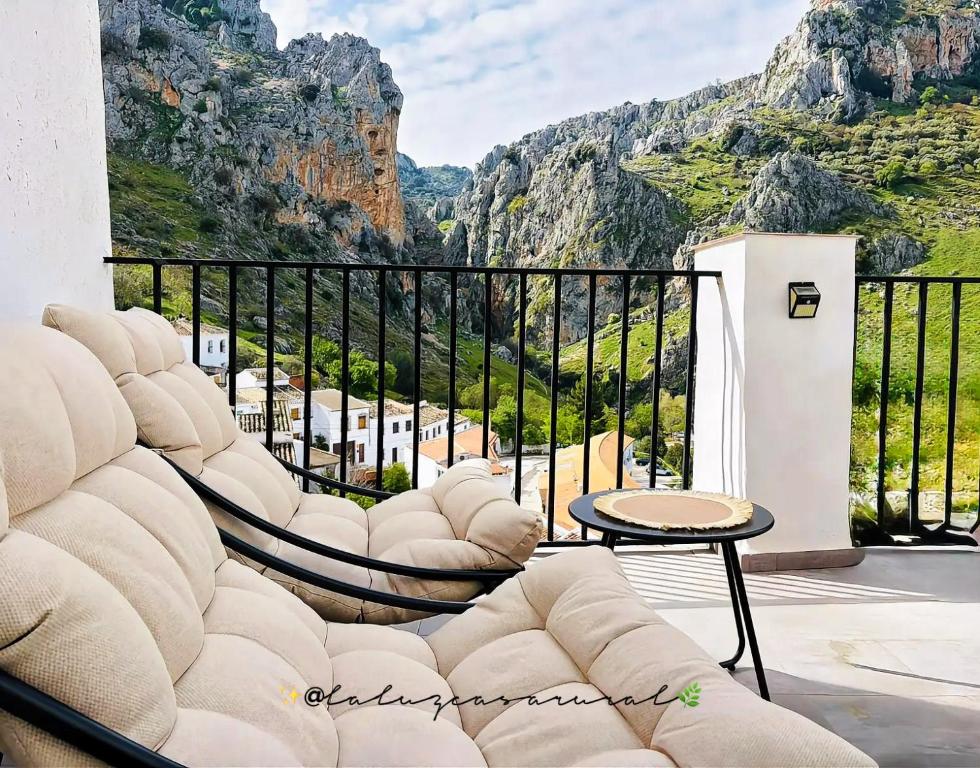 a balcony with a view of a mountain at La Luz in Zuheros
