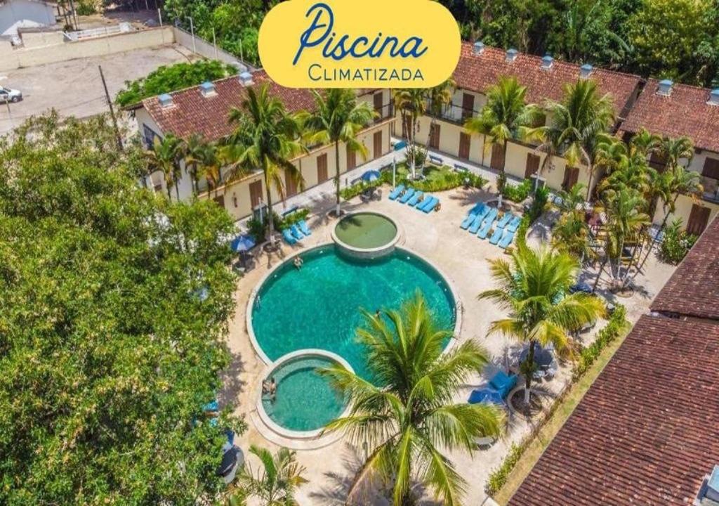 an overhead view of a pool at a resort at Pousada Ilha Vitoria in Ubatuba
