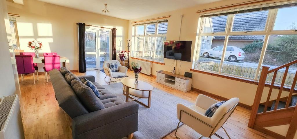 a living room with a couch and a table at 12A-1 Stobhill Road in Arniston