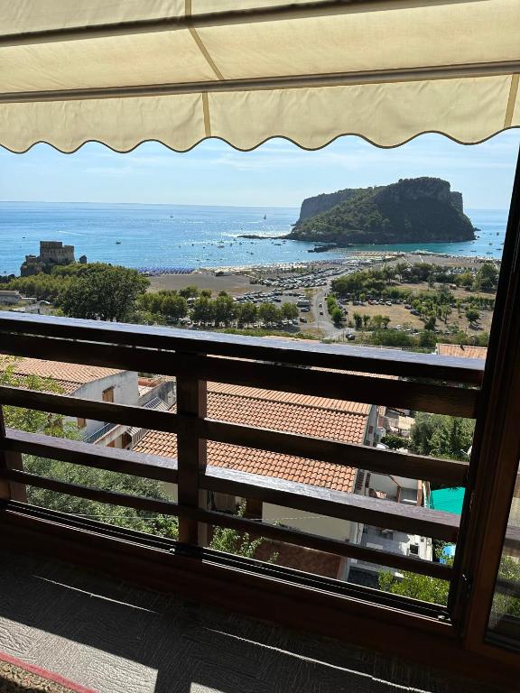 a view of the ocean from a balcony at Hotel Normanni in Praia a Mare