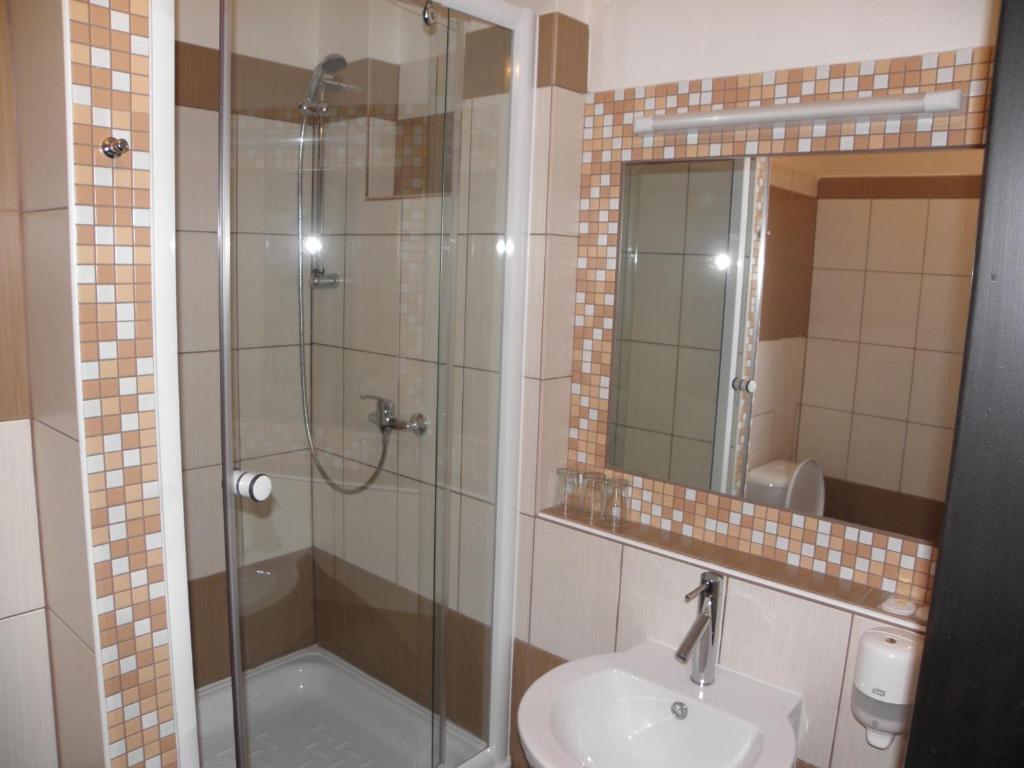 Koupelna v ubytování Hotel Milotel
