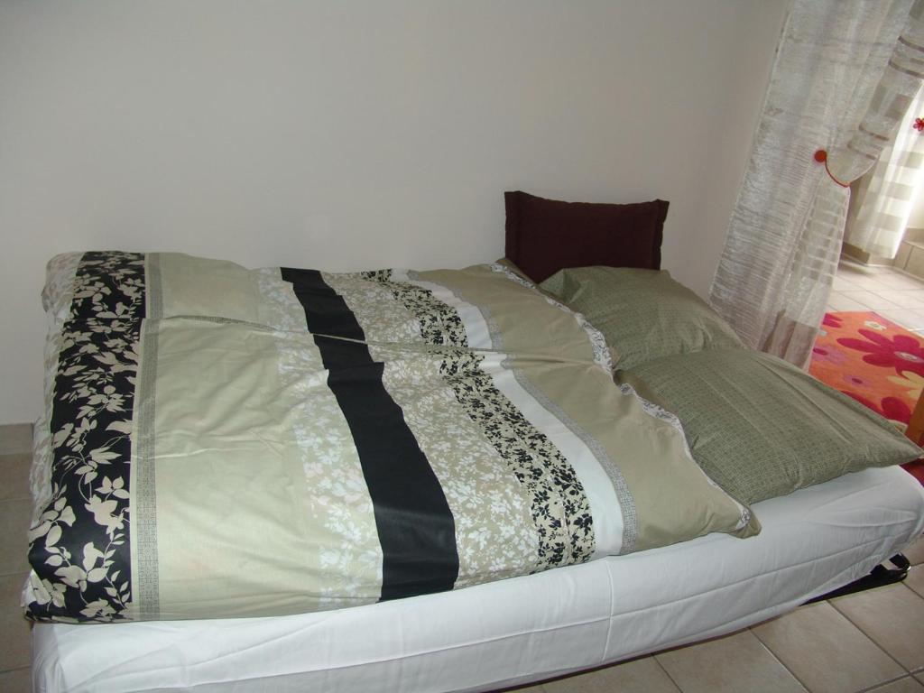 Postel nebo postele na pokoji v ubytování Apartment Natik