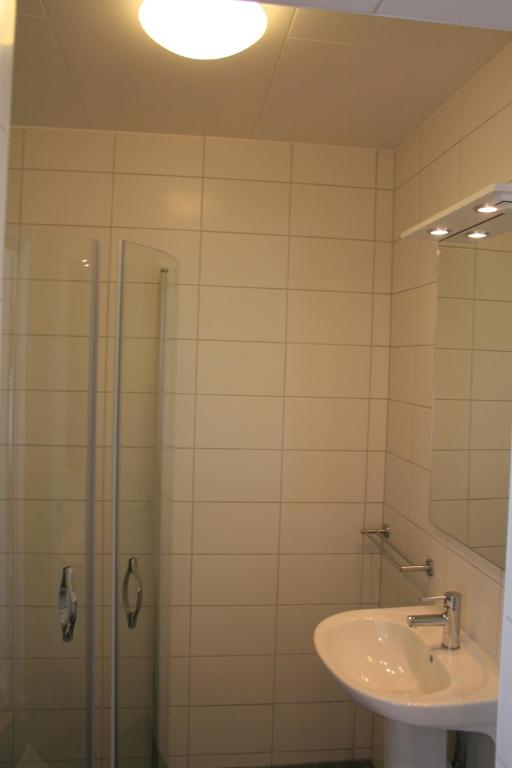 Koupelna v ubytování Flygplatshotellet