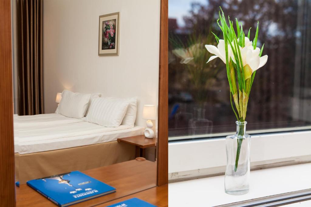 Postel nebo postele na pokoji v ubytování Hotel Expo Stockholm