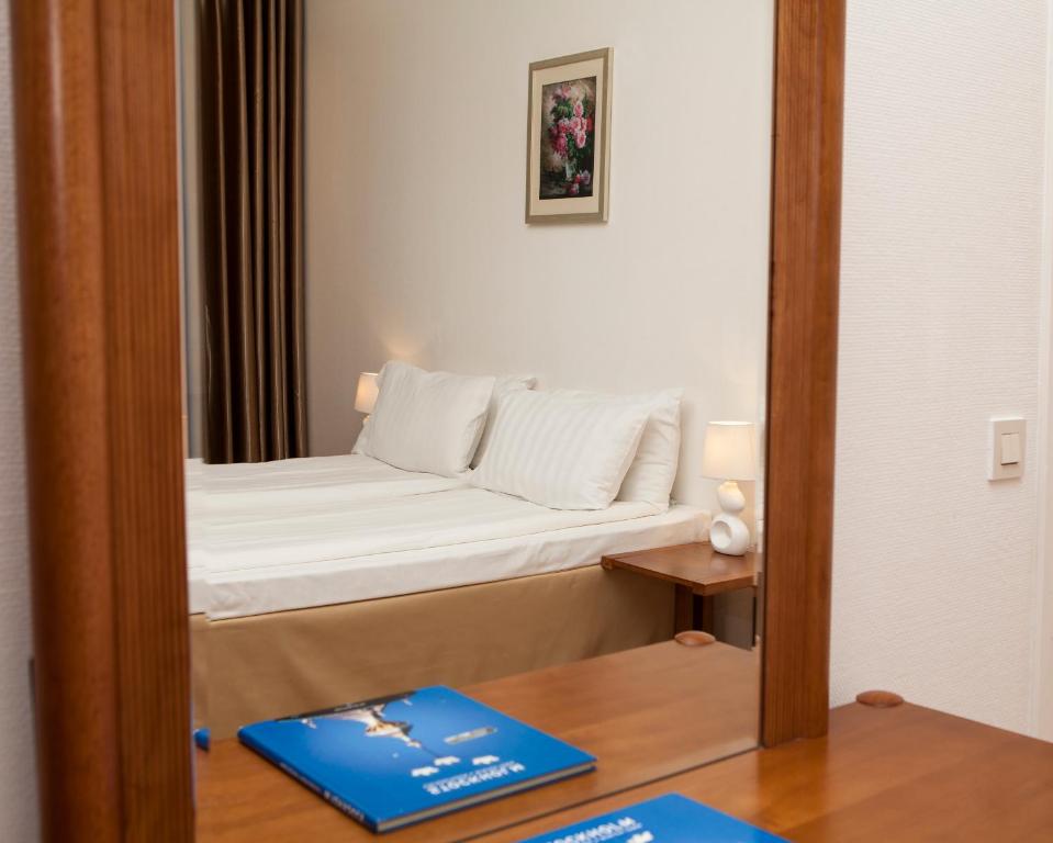 Postel nebo postele na pokoji v ubytování Hotel Expo Stockholm
