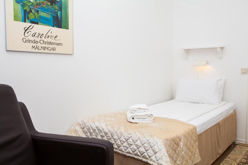 Postel nebo postele na pokoji v ubytování Hotel Expo Stockholm