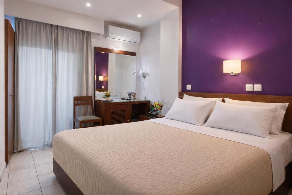 Krevet ili kreveti u jedinici u okviru objekta Epidavros Hotel