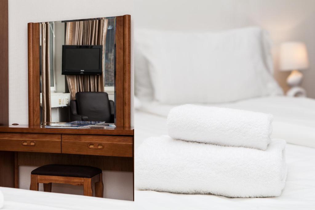 Postel nebo postele na pokoji v ubytování Hotel Expo Stockholm