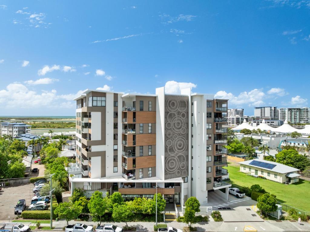 an aerial view of a building in a city at Direct Collective - Rhythm on Beach in Maroochydore