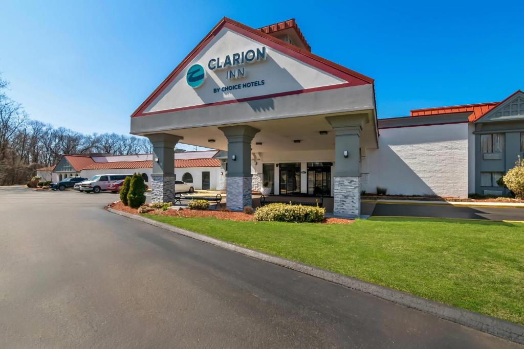 a carleton wa hospital building with a sign on it at Clarion Inn North Haven - New Haven North in North Haven
