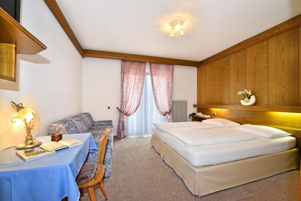 Postel nebo postele na pokoji v ubytování Hotel Hubertushof