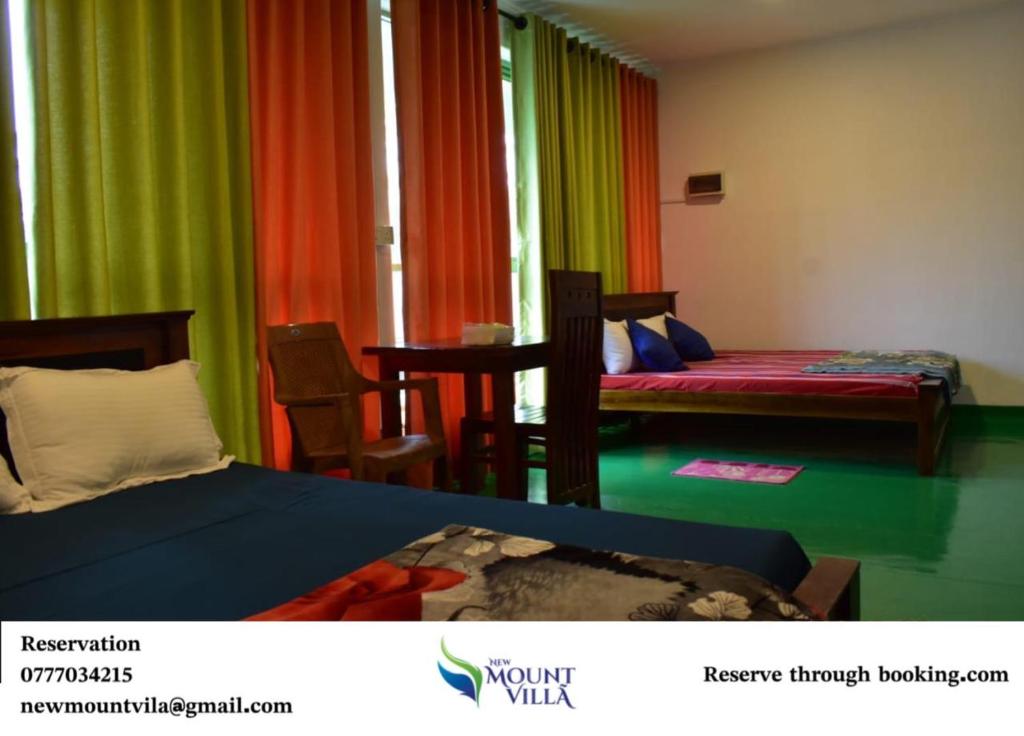 a hotel room with two beds and colorful curtains at New mount villa in Hatton