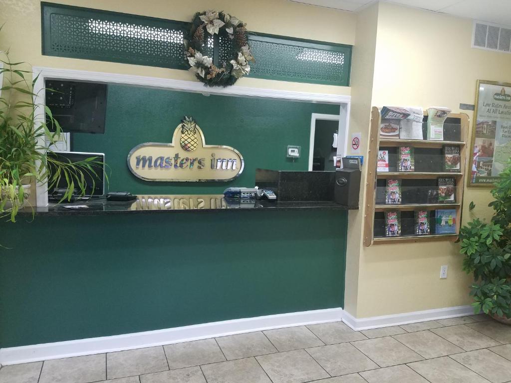 a cashier counter in a store at Masters Inn I-26 in Cayce