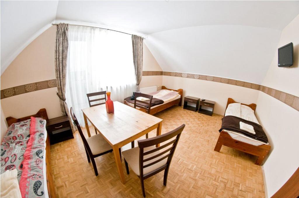 Noclegi ZŁOTA RYBKA - Habitación Familiar