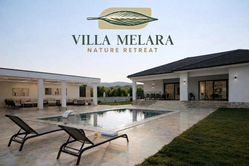 a villa melena nature retreat with a swimming pool and a patio at Villa Melara in Kızılyurd