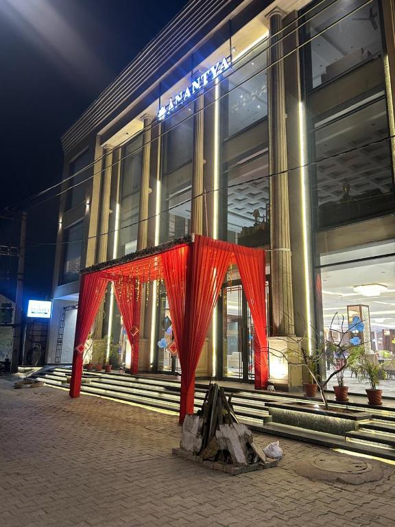 a red object in front of a building at ANANTYA BANQUET and HOTEL in Sonīpat