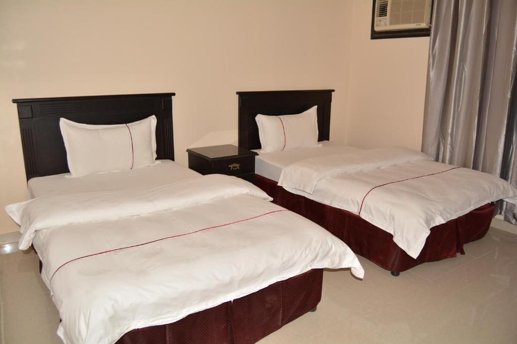 Postel nebo postele na pokoji v ubytování Orient House