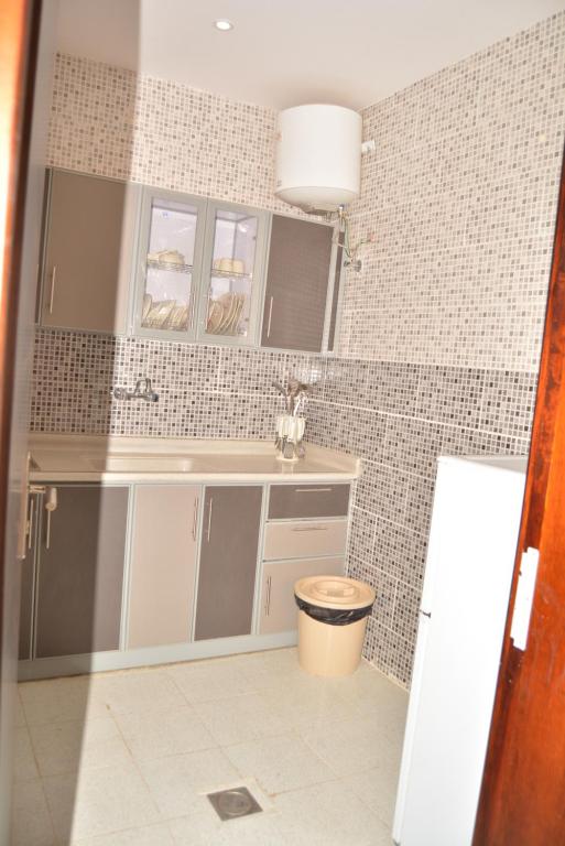 Kuchyň nebo kuchyňský kout v ubytování Orient House