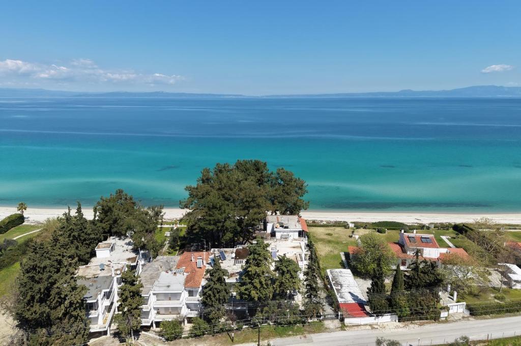 an aerial view of houses and the ocean at Avra breeze in Kriopigi