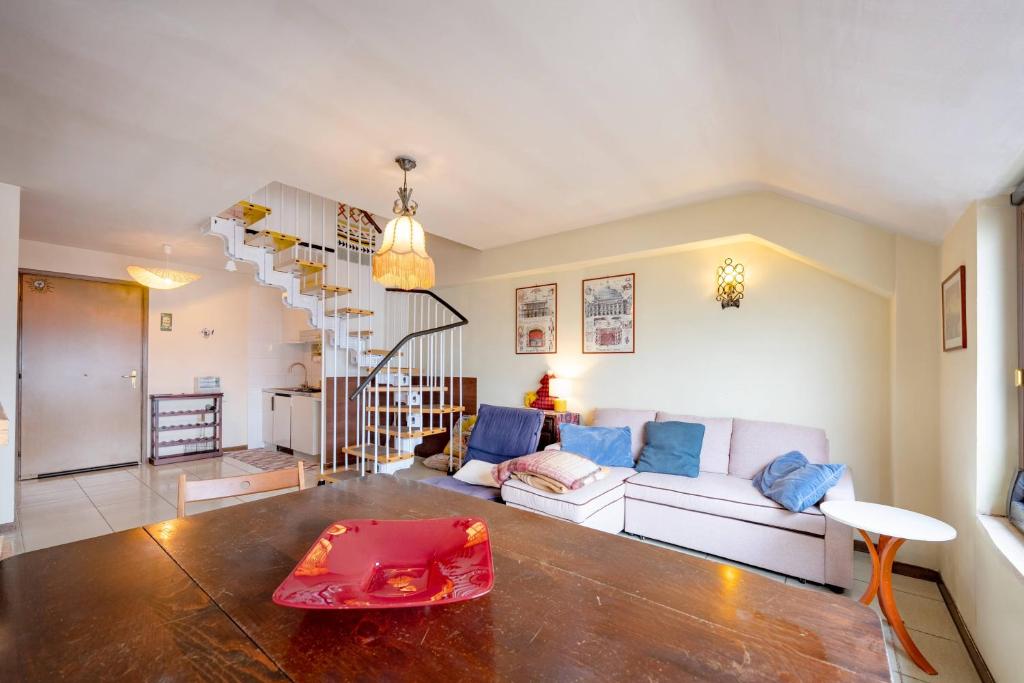 a living room with a couch and a table at Guest Art Campitello Matese in Campobasso