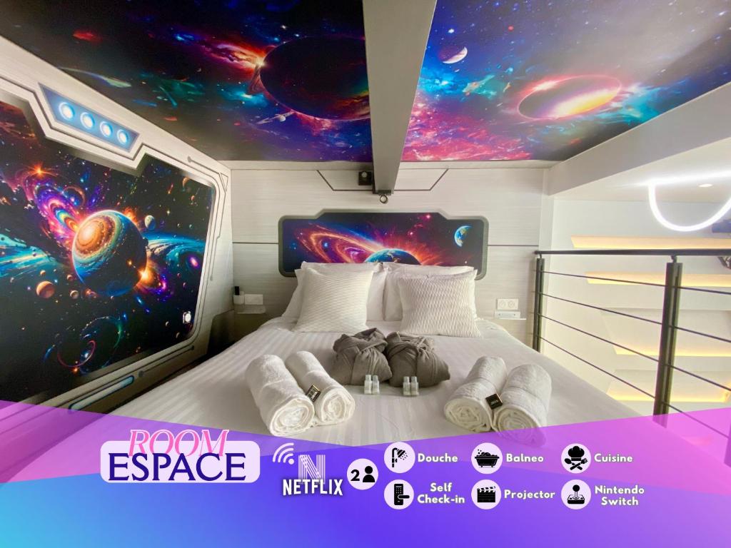 a bedroom with a space themed ceiling at Espace-Jacuzzi-Cinema-Nintendo switch in Roubaix