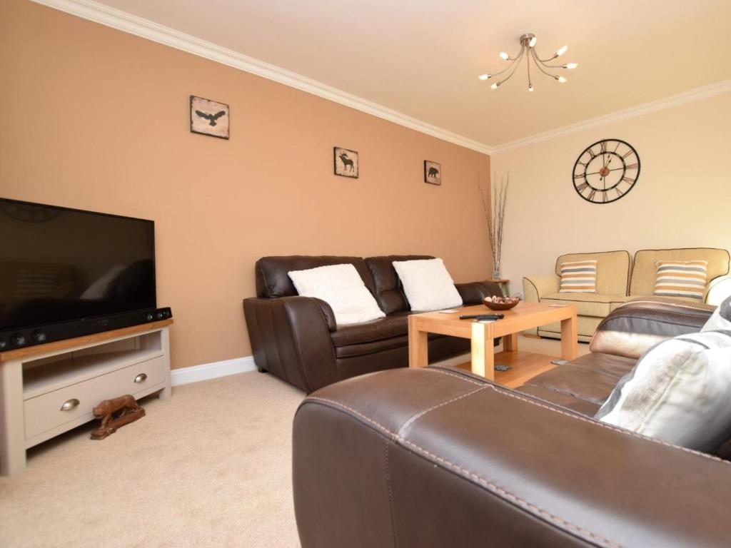 a living room with a couch and a flat screen tv at 3 Bed in Galashiels oc-76698 in Galashiels