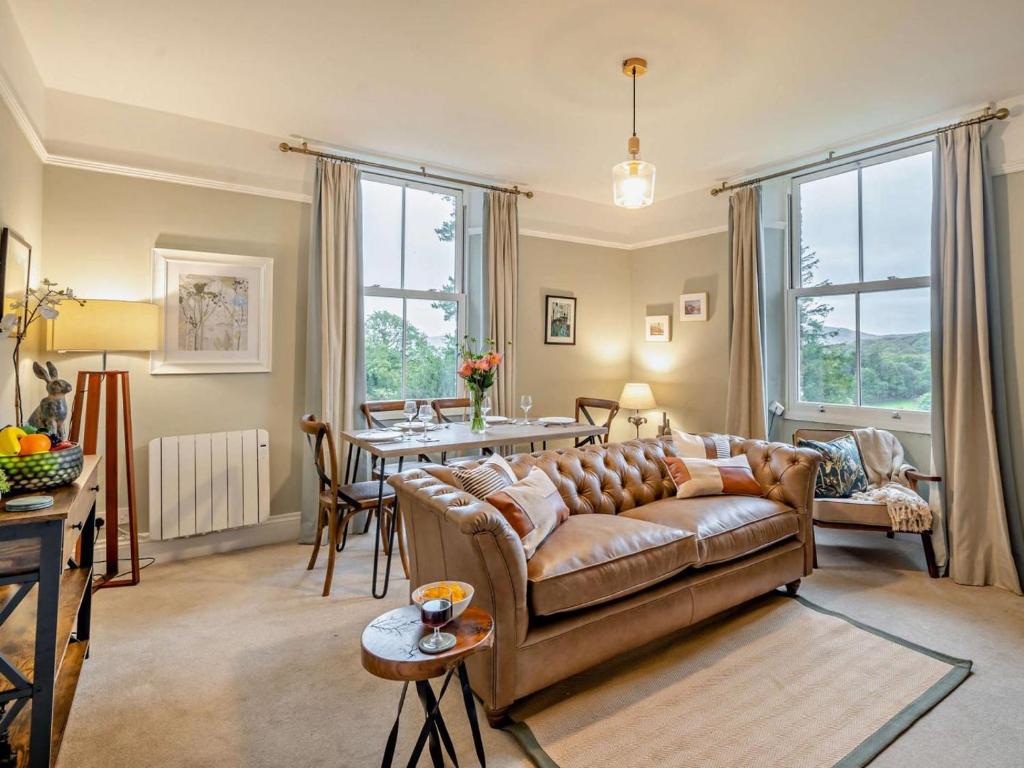 a living room with a couch and a table at 2 Bed in Ambleside oc-93287 in Near Sawrey