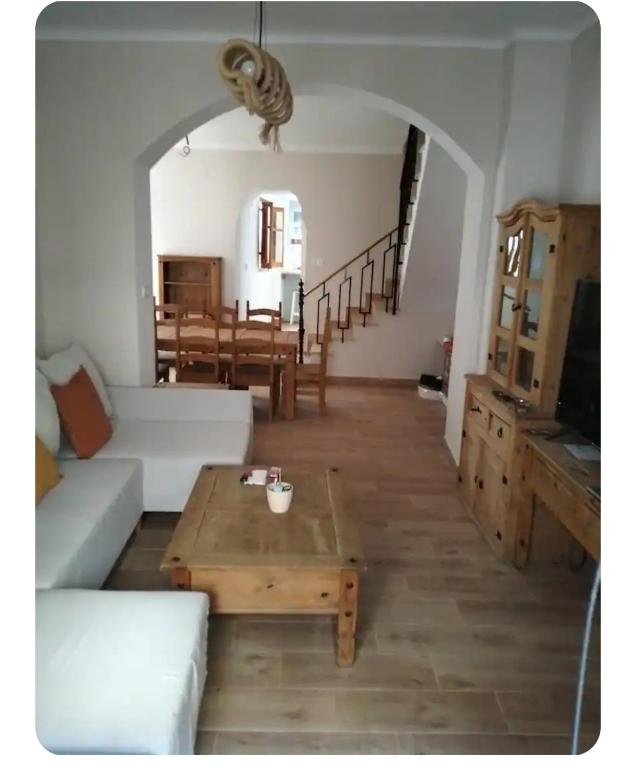 a living room with a couch and a table at La Bohème in Antequera