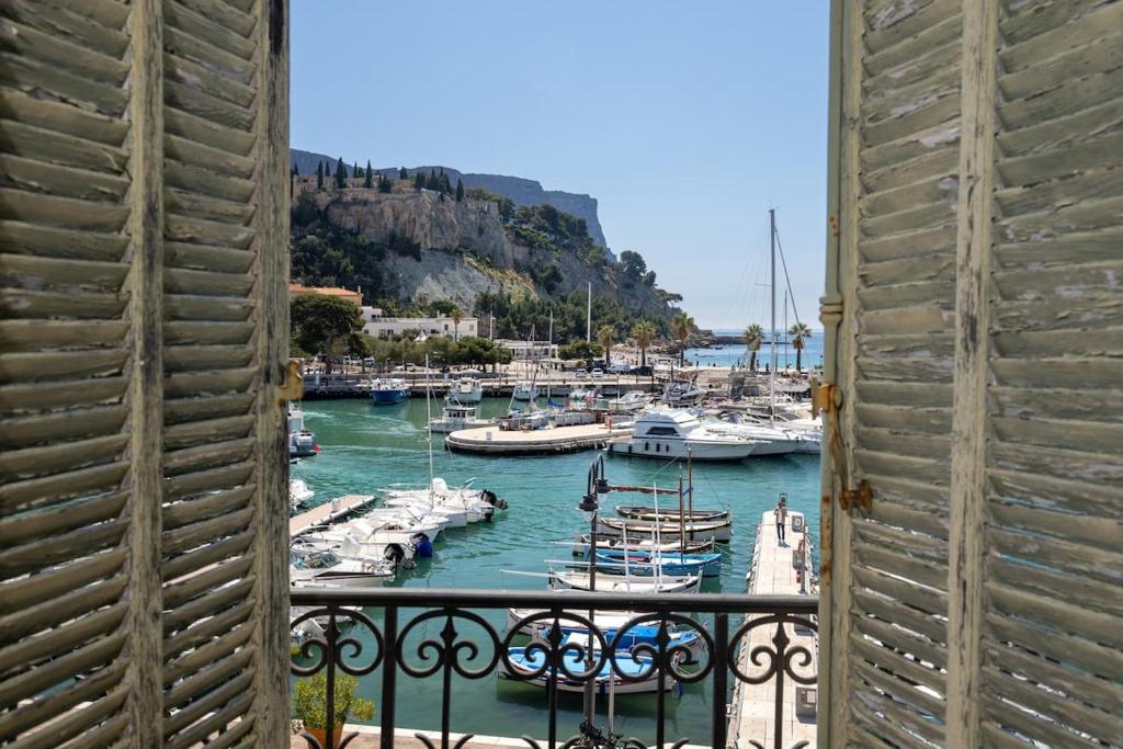 a view of a marina with boats in the water at Le Mistral par Dodo-a-Cassis in Cassis