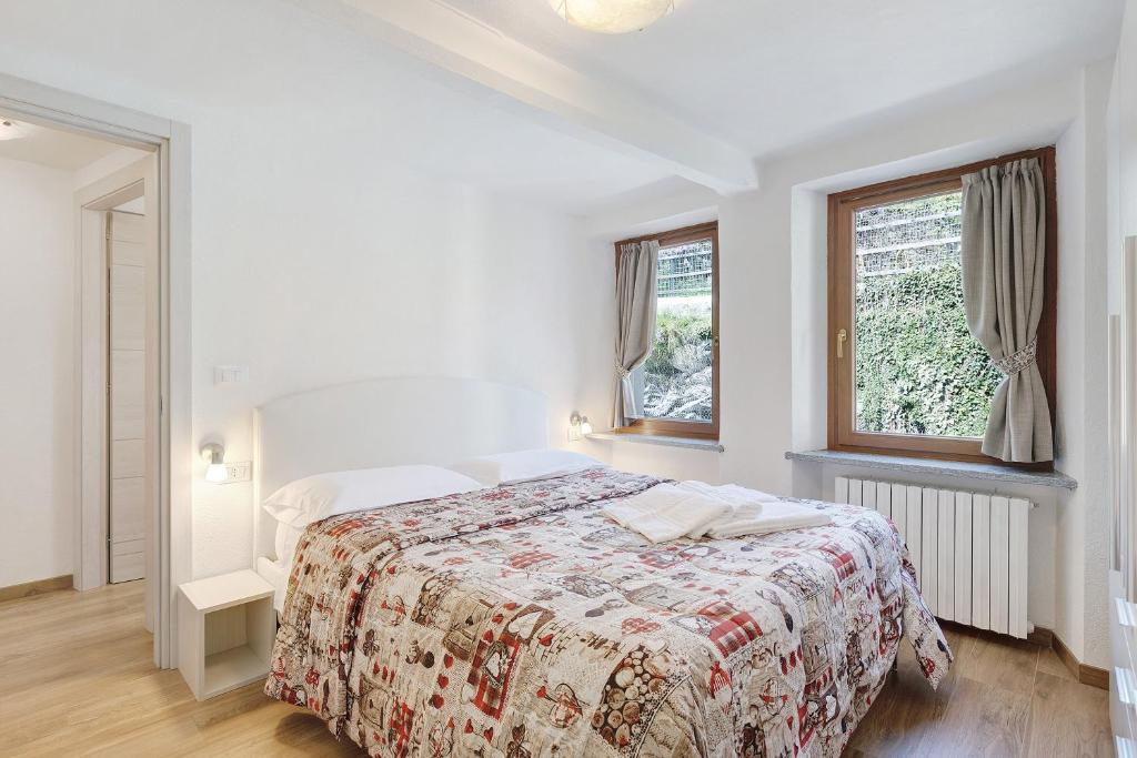 Llit o llits en una habitació de Maison Sandra