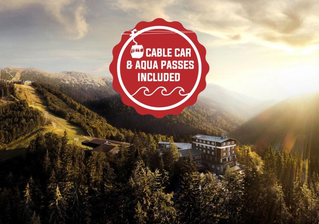 a sign for a castle center and aanu passes involved at Hotel Srdiečko in Tale