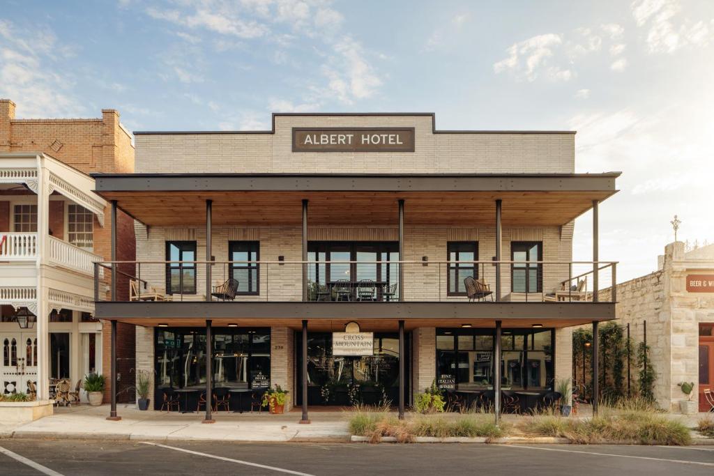 an exterior view of an apartment hotel at Albert Hotel in Fredericksburg