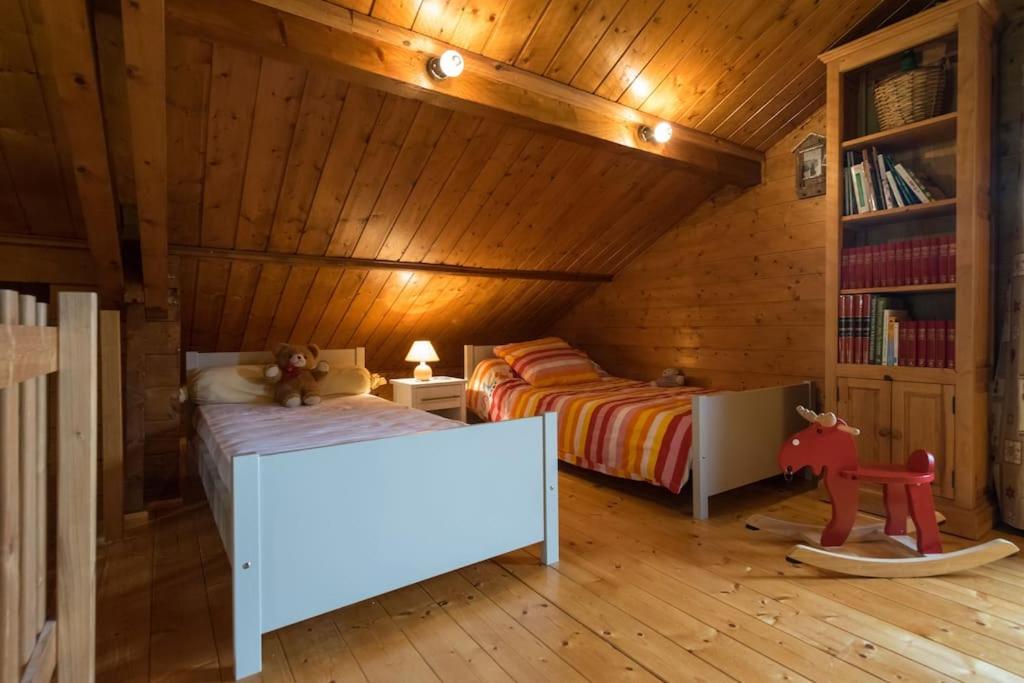Postel nebo postele na pokoji v ubytování Les Clarines