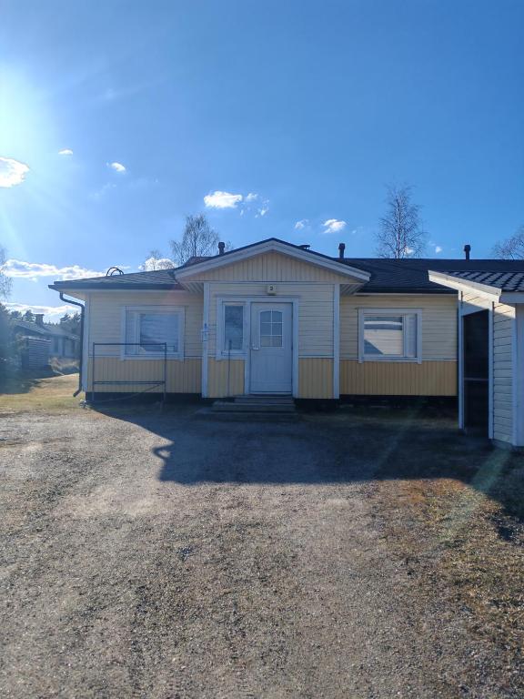 a house with a driveway in front of it at Pikkurinki 28 As 2, 62300 Härmä Kauhava in Alahärmä