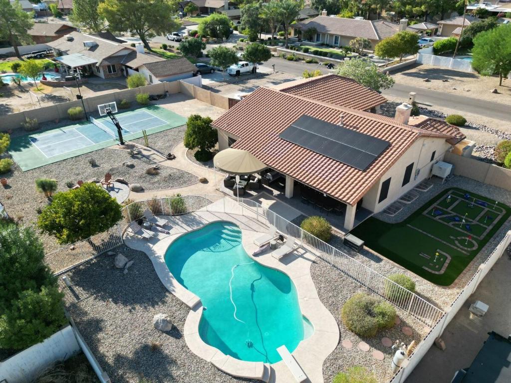an overhead view of a house with a swimming pool at Glendale Paradise - Pool - Pickleball - Putt-Putt in Glendale