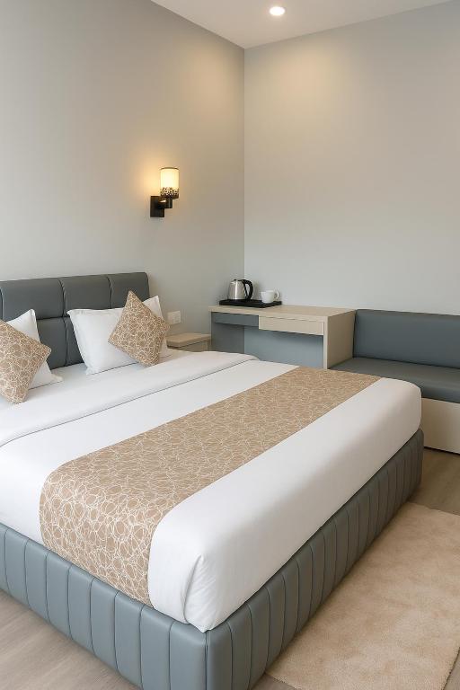 a bedroom with a large bed in a room at The Aura - Backpacker Stop in Nainital
