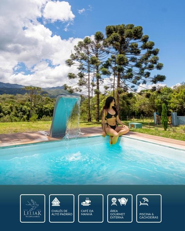 a woman in a bikini sitting on a raft in a swimming pool at Hospedaria Leliak - Retiro Boutique de Montanha in Aiuruoca