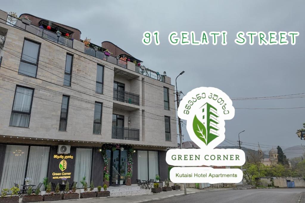 a building with a sign for a green corner at Green Corner Kutaisi in Kutaisi