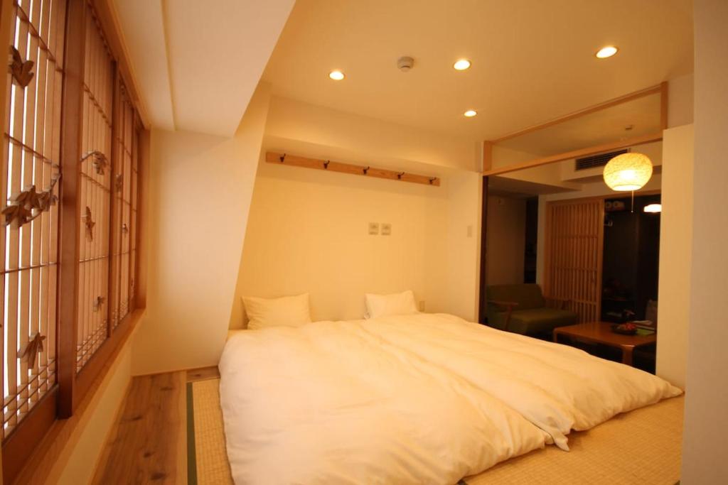 NAGAMORIYA 30 seconds on foot from Shin-Osaka Station Free Wi-Fi
