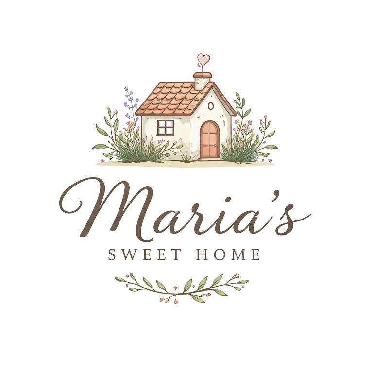a house with areath of flowers and the words marias sweet home at Maria's Sweet Home in Chios