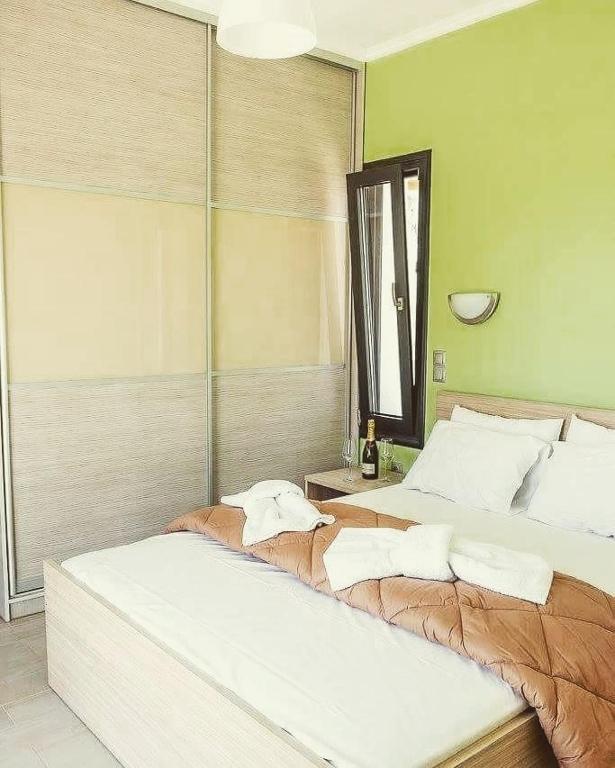 Postel nebo postele na pokoji v ubytování Golden Sun Villas