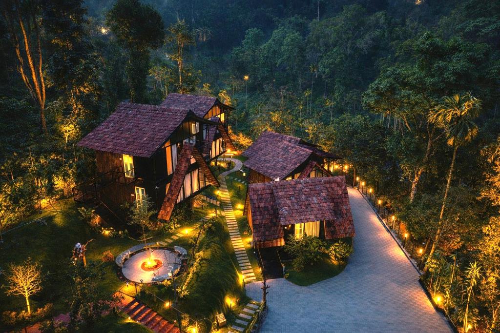 an overhead view of a house with lights at Wood Panda Luxury Resort Wayanad in Meppādi