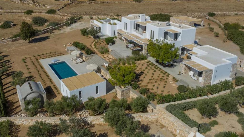 an aerial view of a house with a swimming pool at Callirhoe 180 in Poros