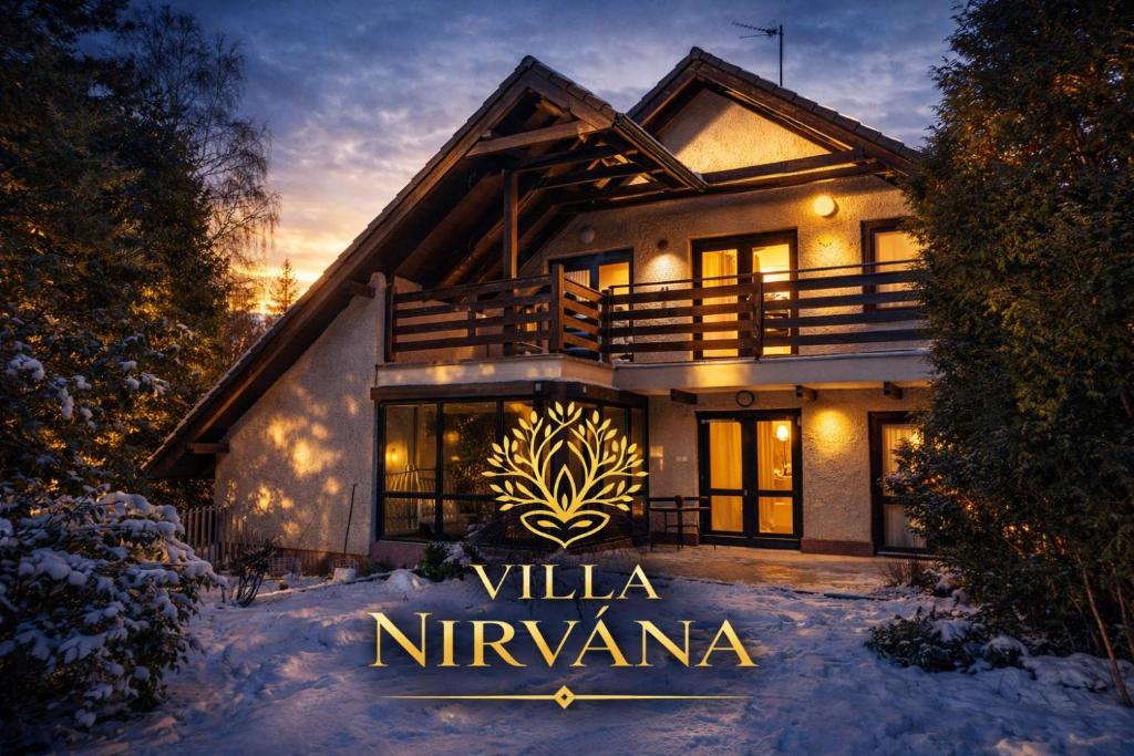 a house with a sign that reads villa nirvana at Villa Nirvána in Františkovy Lázně